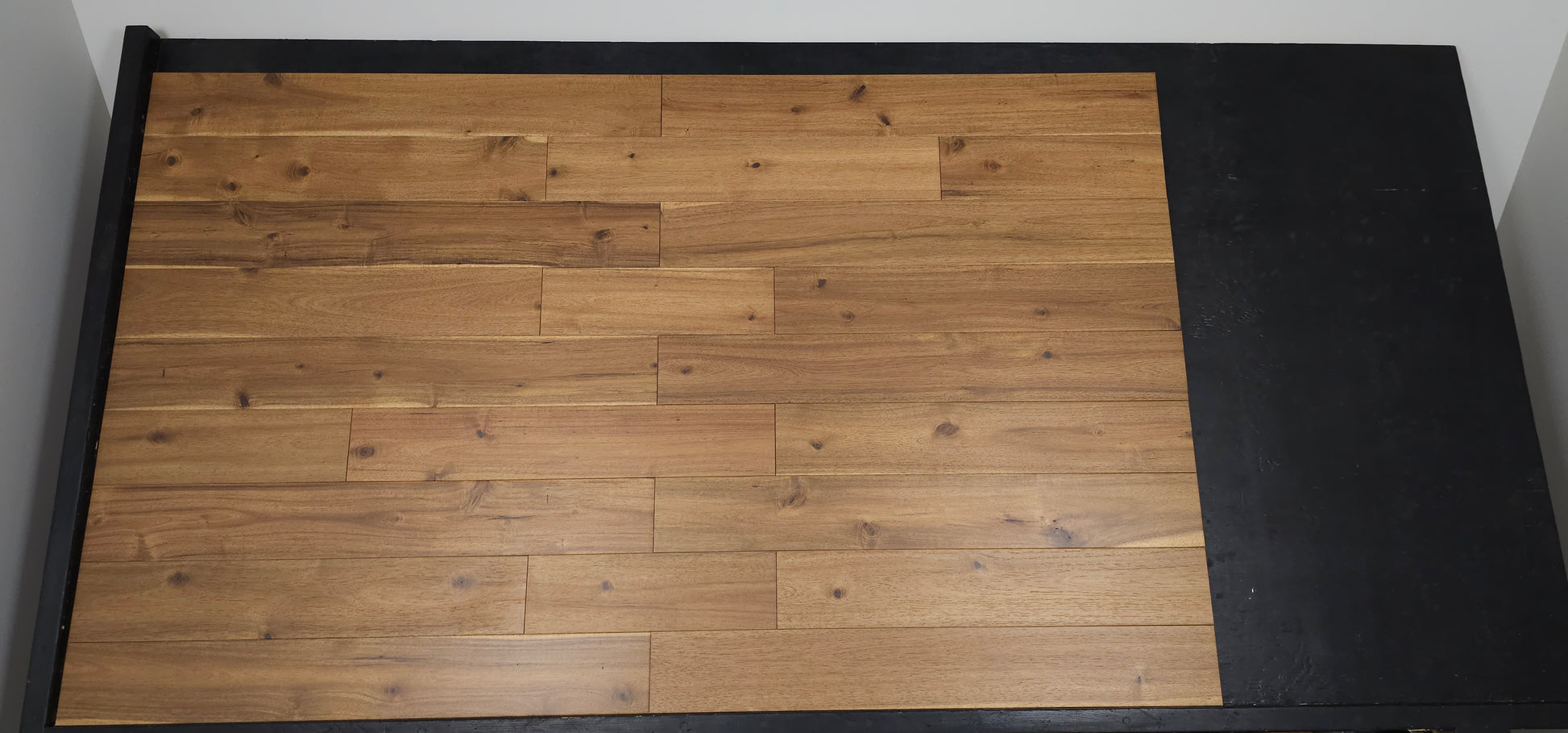 5" x 3/4" Asian Walnut Almond Hardwood Flooring on a black shooting table front on shot
