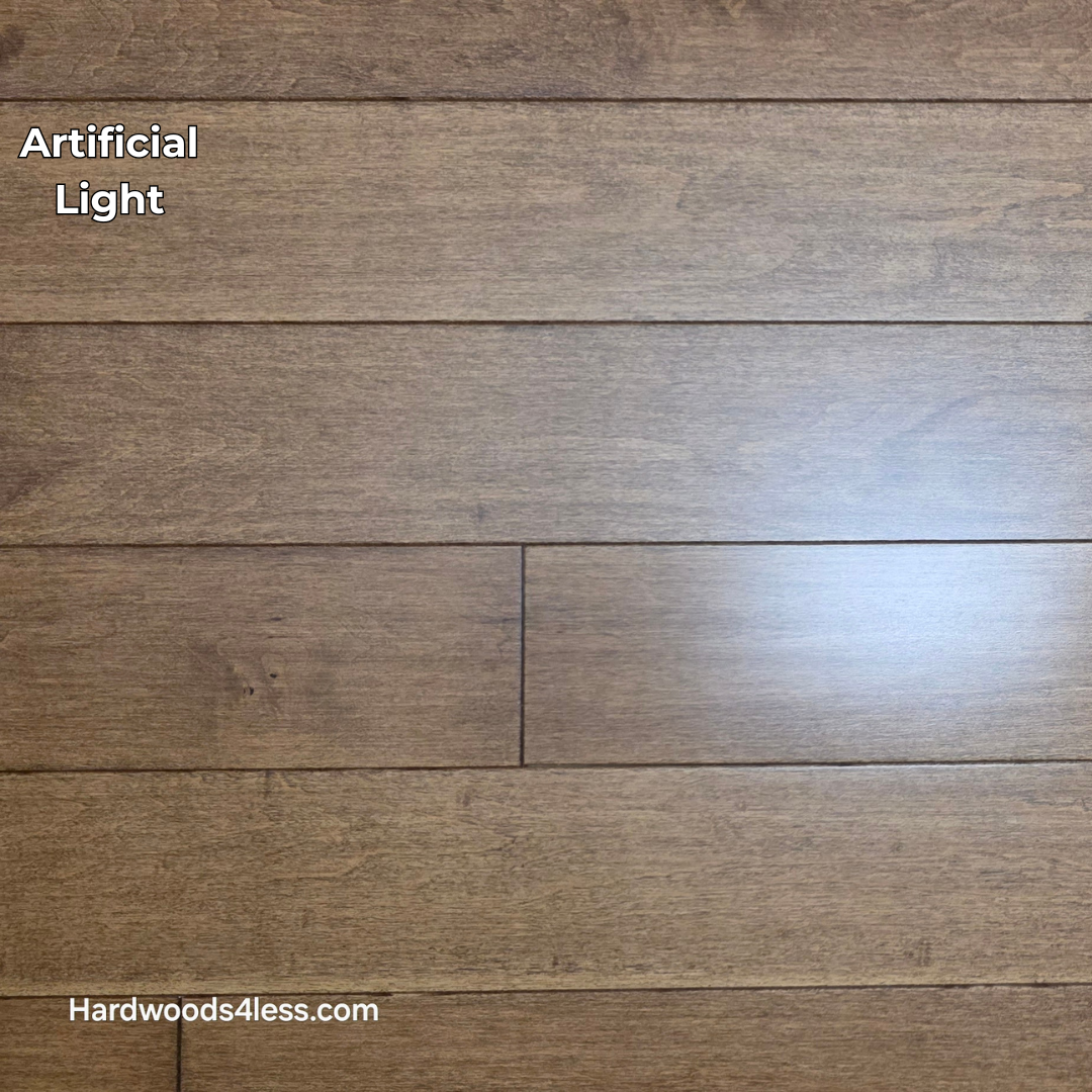 4" x 3/4" Solid Maple Hazelnut Hardwood Flooring. Shown in artificial lighting.