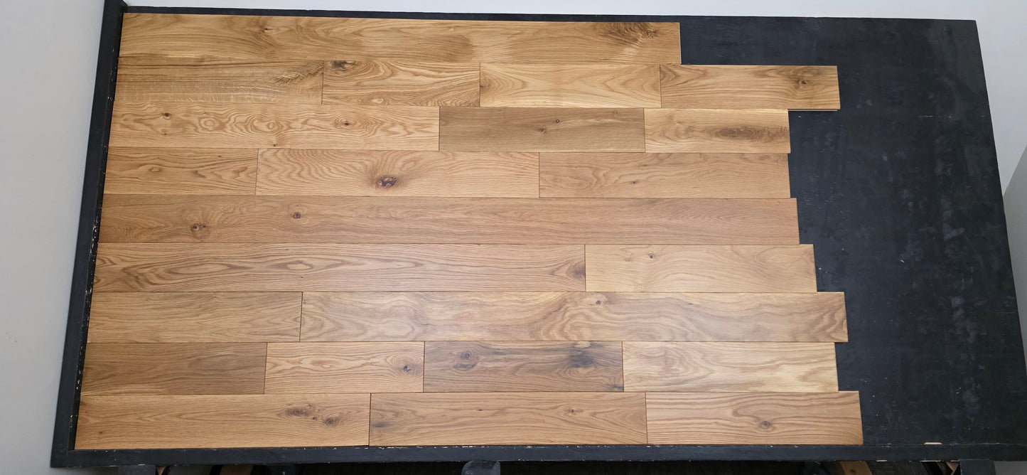 White Oak Hardwood Flooring on a black racking table