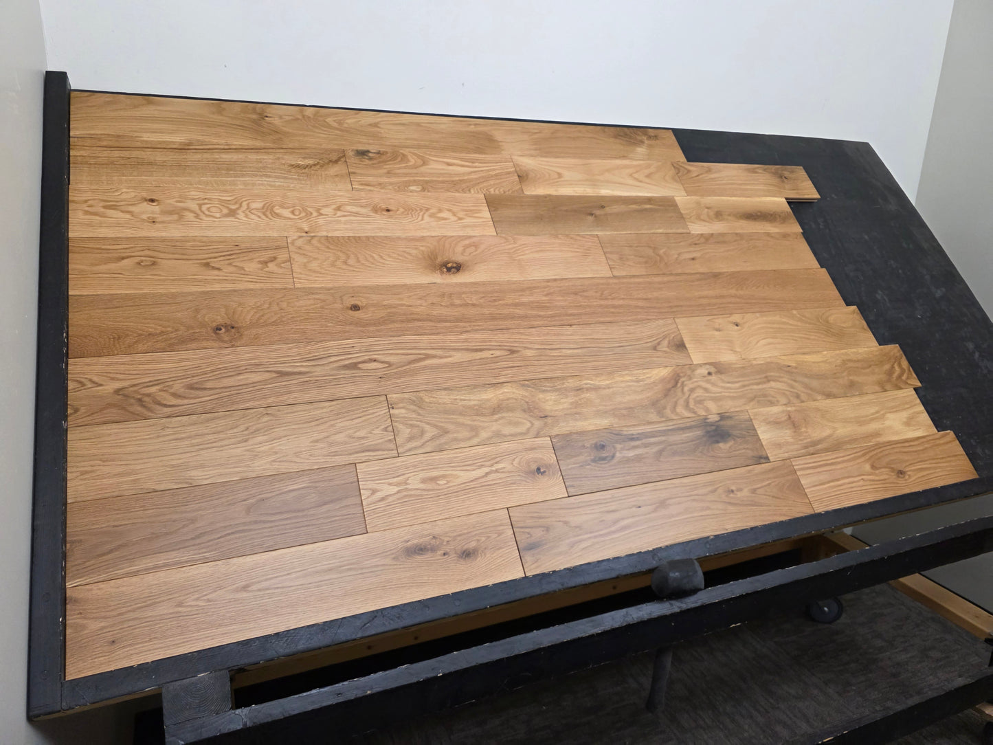 White Oak Hardwood Flooring left side shot on a black table