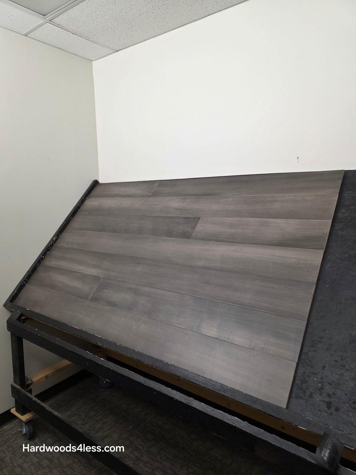 6 1/2" x 1/2" Engineered Maple Autumn Ash Hardwood Flooring. Shown on a black shooting table