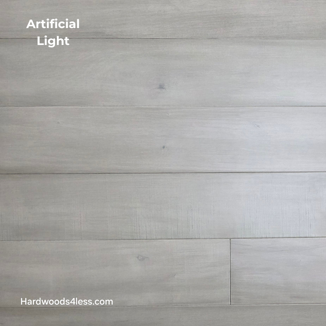 6 1/2" x 1/2" Engineered Maple Polar Palace Hardwood Flooring shown in artificial lighting