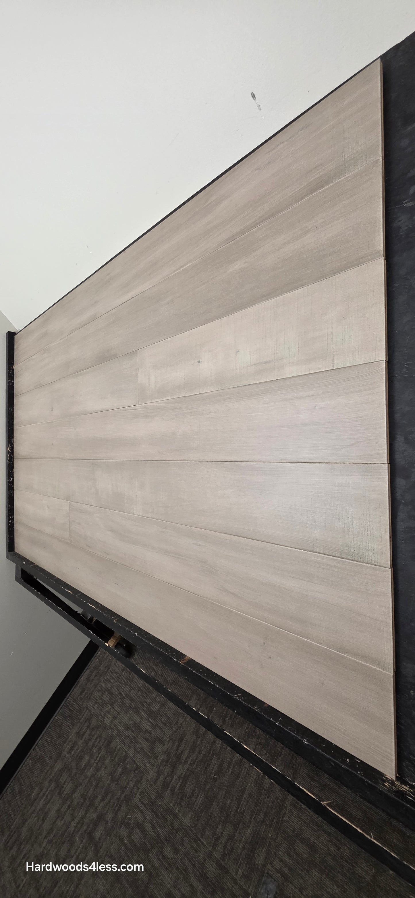 6 1/2" x 1/2" Engineered Maple Polar Palace Hardwood Flooring shown on a black shooting table.