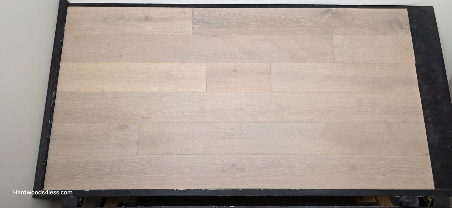 7 1/2" x 9/16" Engineered European Oak Sark Hardwood Flooring shown on a black shooting table. Shot head on.