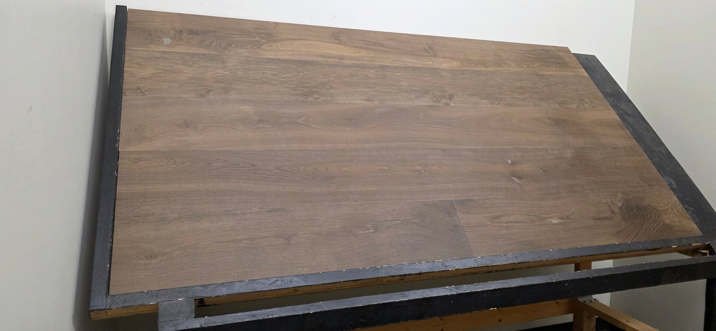 Engineered Unfinished Smoked European Oak Hardwood Flooring wide shot on black table