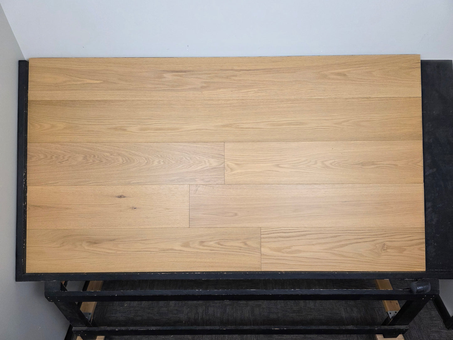9 1/2" x 5/8" Engineered Red Oak Oberon Hardwood Flooring front on shot wide lens on a black board