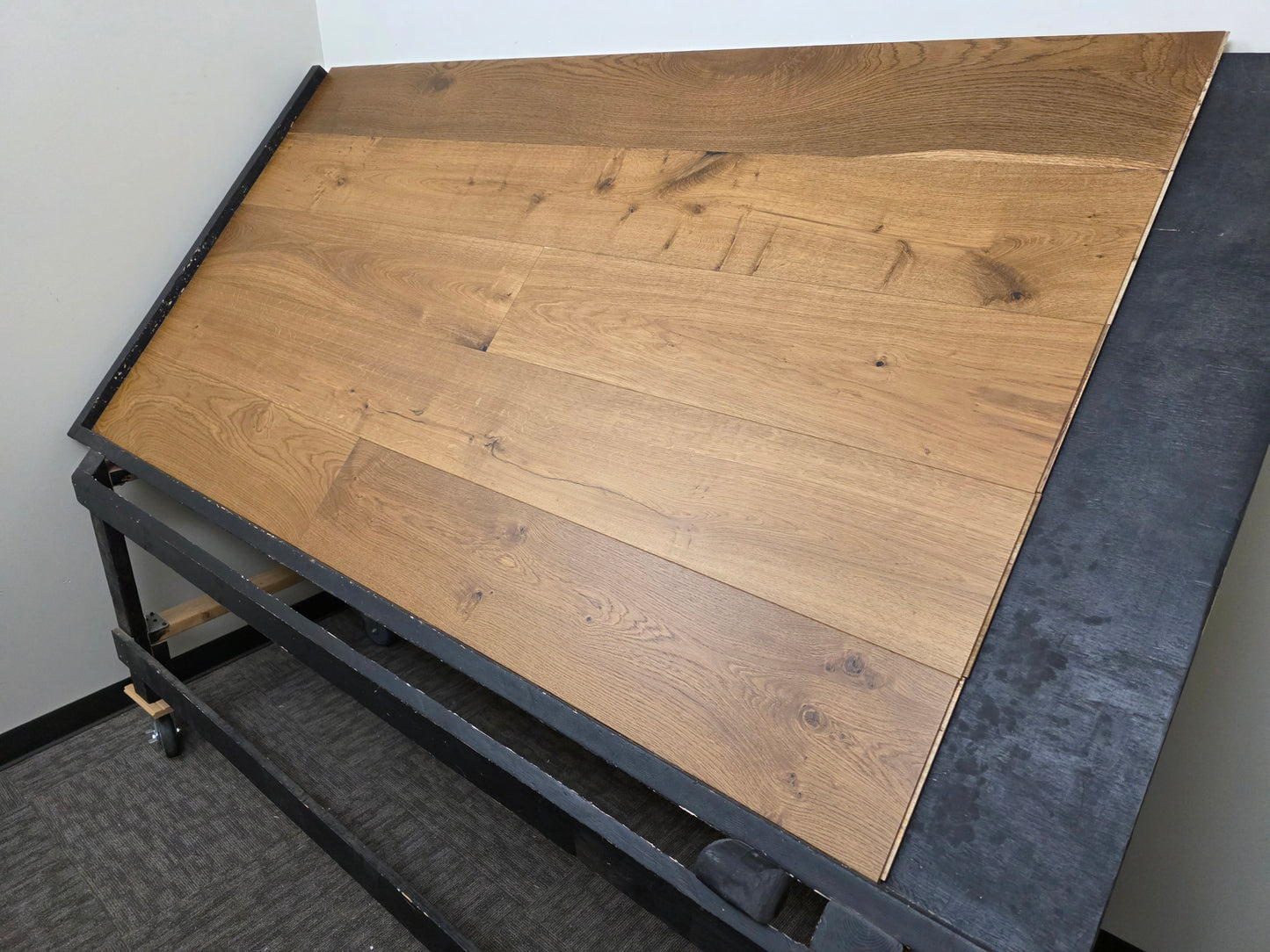 Engineered European Oak Titan Hardwood Flooring on a black racking table shot from the right hand side