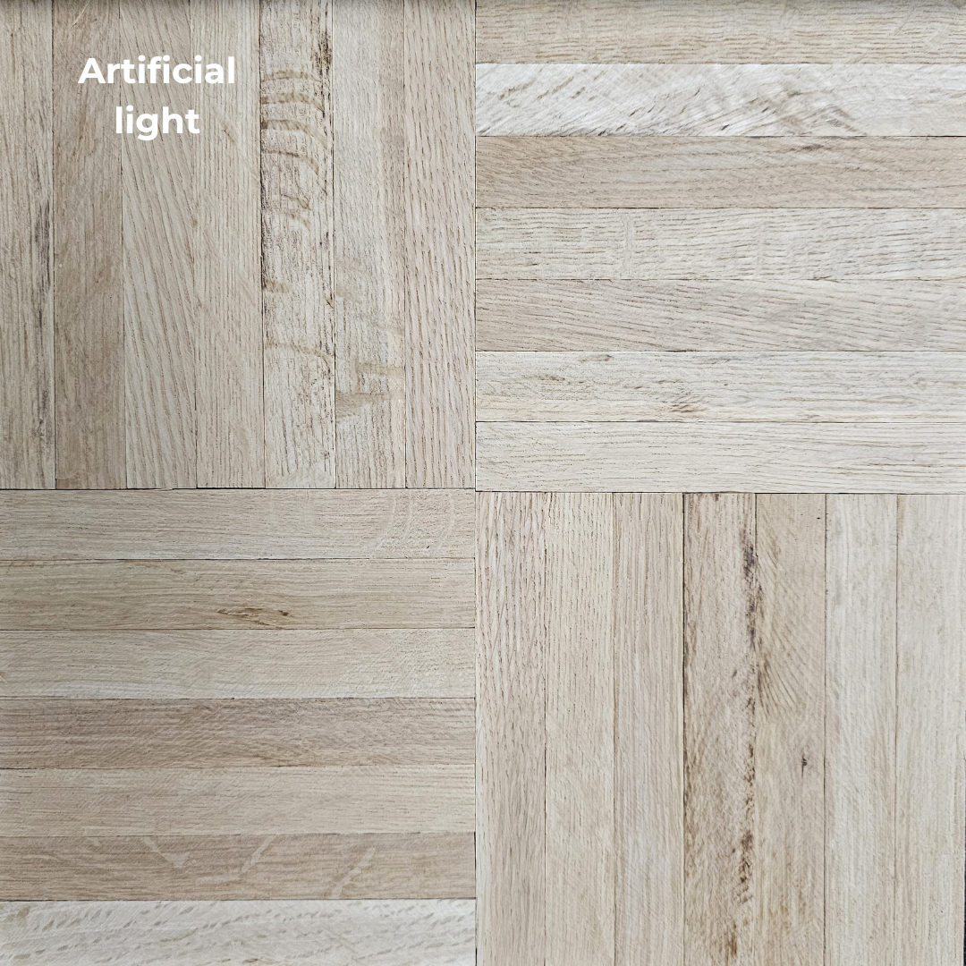 Unfinished White Oak 7-slat Parquet Hardwood Flooring shown in artificial lighting