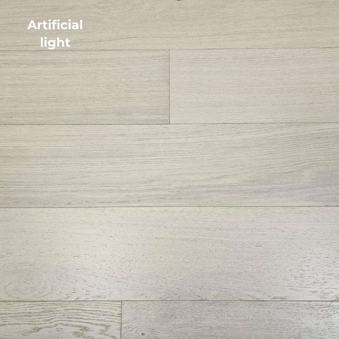 7 1/2" x 1/2" Engineered European Oak Sandy Oasis Stain Hardwood Flooring shown in artificial lighting