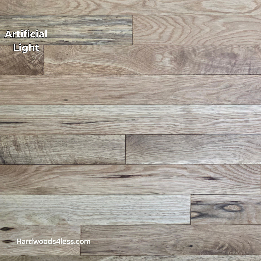 3 1/4" x 3/4" Solid White Oak Natural Character Grade Hardwood Flooring. Shown in artificial lighting.