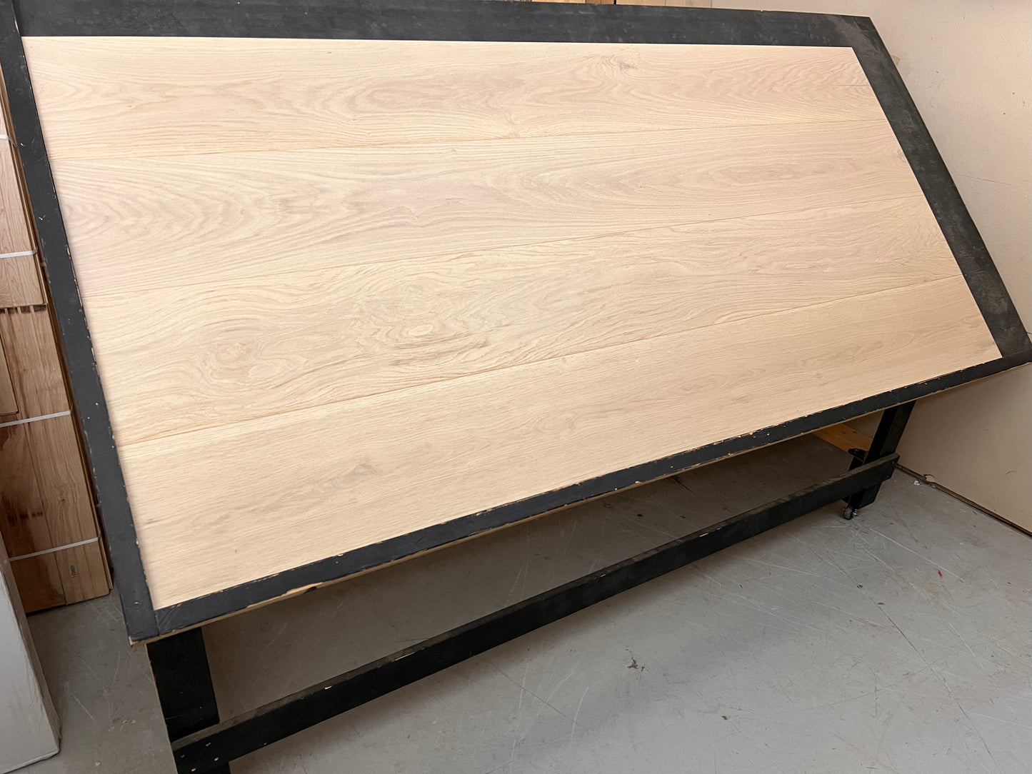 10.25" x 5/8" Engineered Oak Tarrytown Hardwood Flooring on a black shooting table
