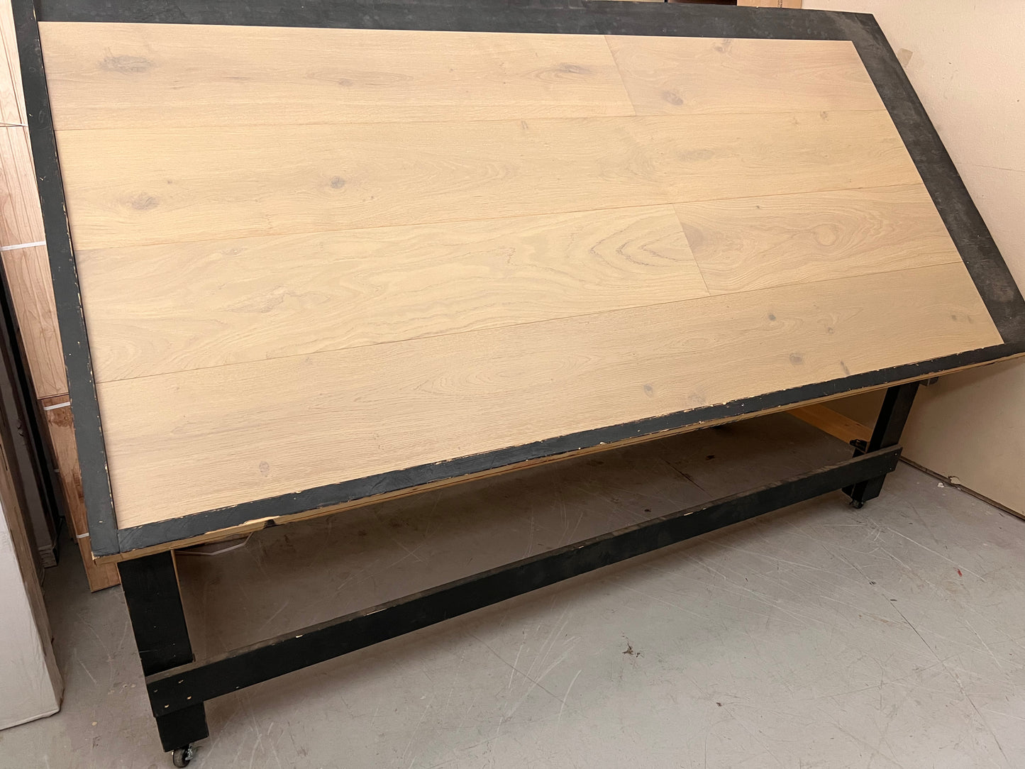 10.25" x 5/8" Engineered Oak Rollingwood Hardwood Flooring on a black shooting table