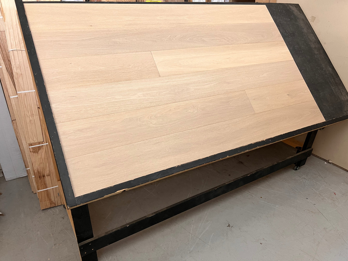 7 1/2" x 5/8" Engineered Oak Rosedale Hardwood Flooring on a black shooting rack
