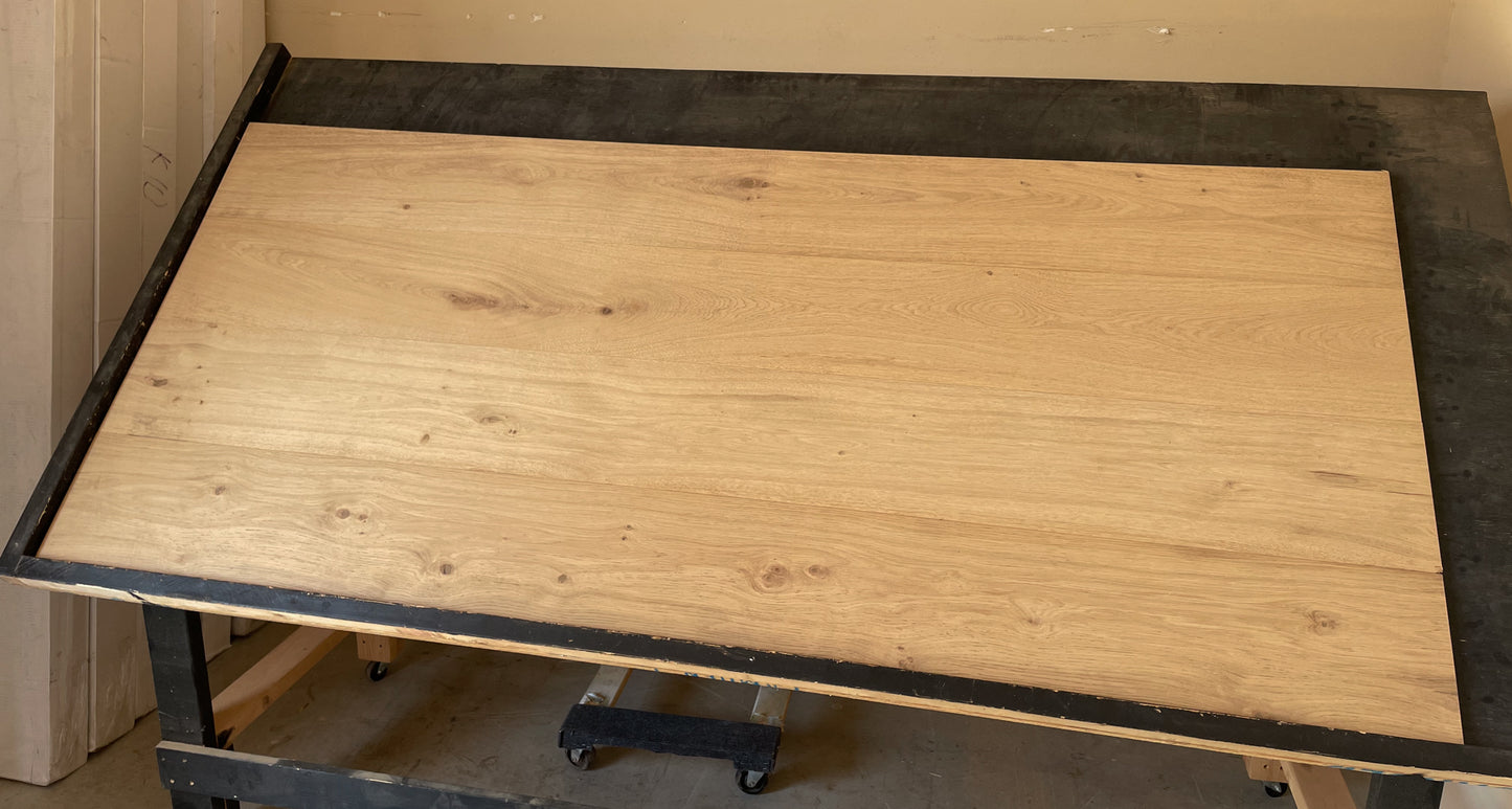 9.45" x 3/4" Engineered European Oak Niagara Stain Hardwood Flooring shown on a black shooting table