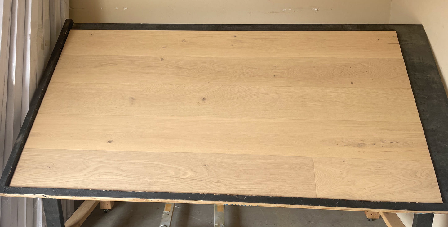 8.66" x 5/8" Engineered European Oak Del Mar Stain Hardwood Flooring shown on a black shooting table