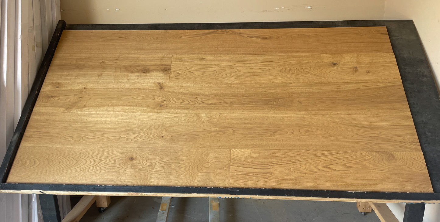 8.66" x 5/8" Engineered European Oak Loma Stain Hardwood Flooring shown on a black shooting table