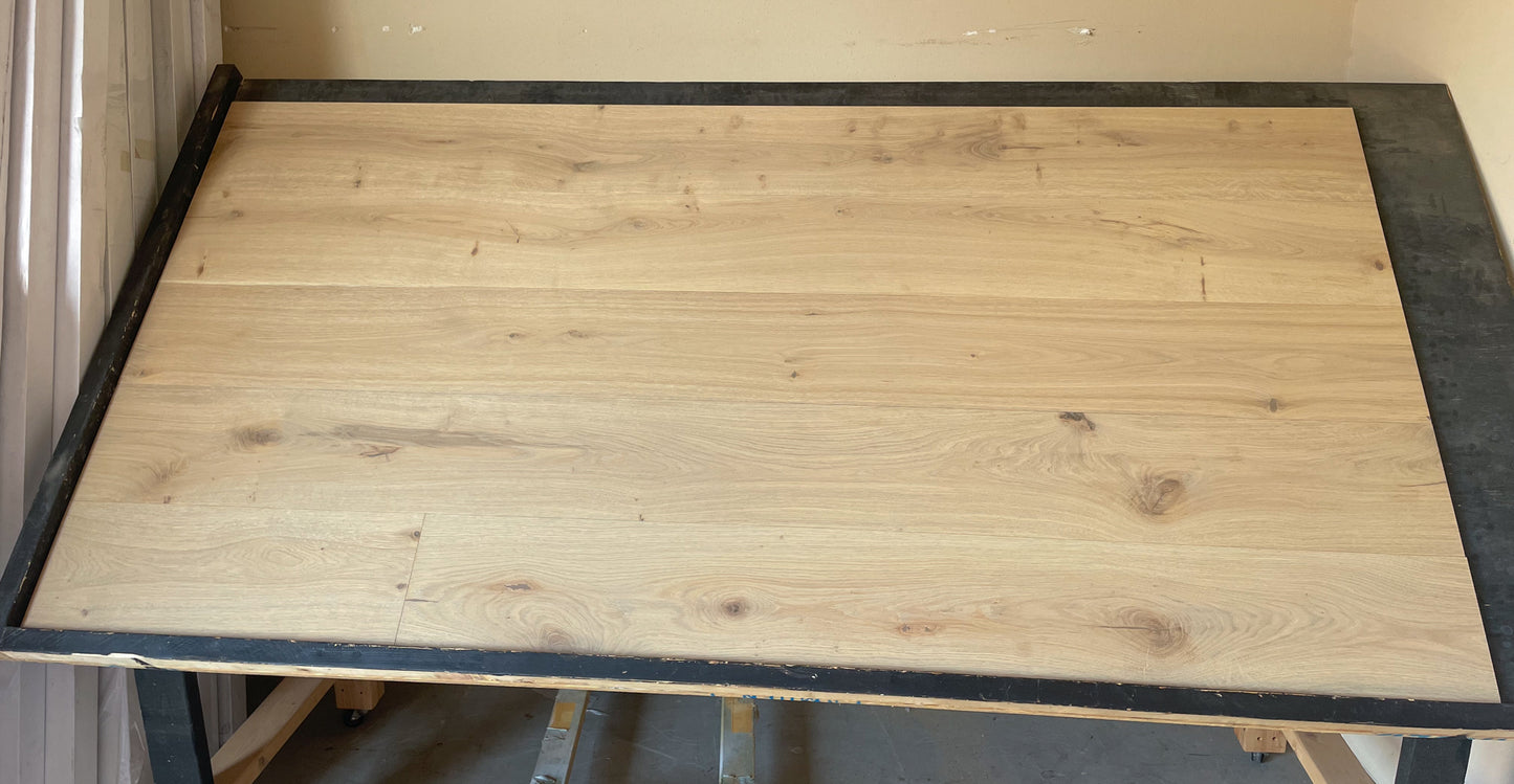 8.66" x 5/8" Engineered European Oak Laguna Stain Hardwood Flooring shown on a black shooting table