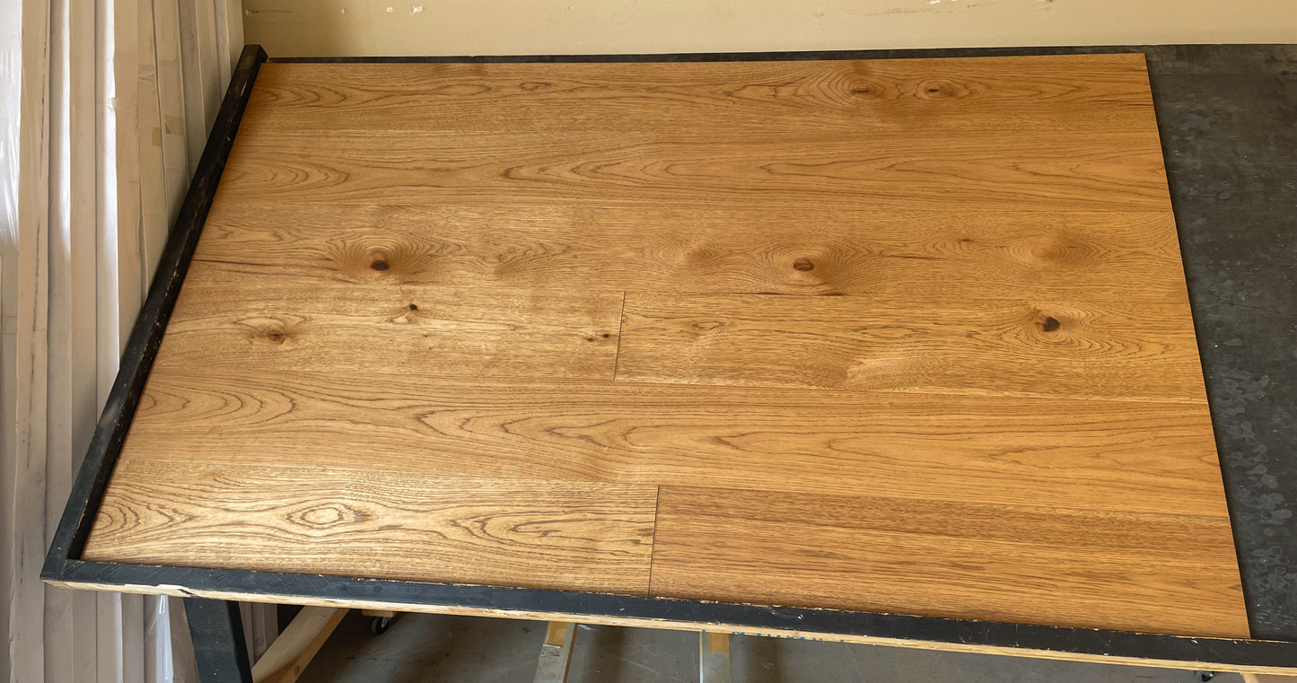 7 1/2" x 1/2" Engineered Hickory Brookings Stain Hardwood Flooring shown on a black shooting rack