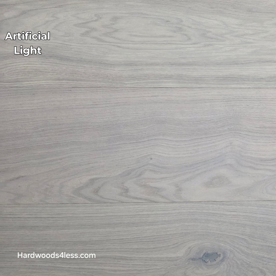 10.67" x 7/16" Modernized Engineered European Oak Corbusier Hardened Hardwood Flooring. Shown in artificial lighting. 