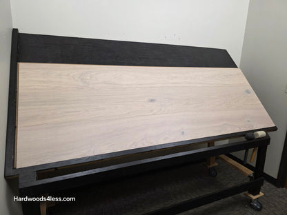 10.67" x 7/16" Modernized Engineered European Oak Corbusier Hardened Hardwood Flooring. Shown on a black shooting table. Shot from wide left.