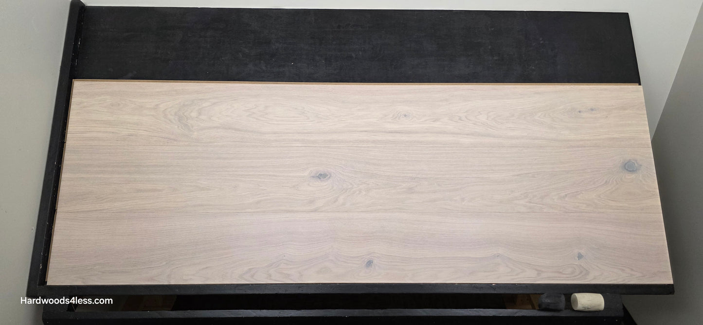 10.67" x 7/16" Modernized Engineered European Oak Corbusier Hardened Hardwood Flooring. Shown on a black shooting table. Shot from center.