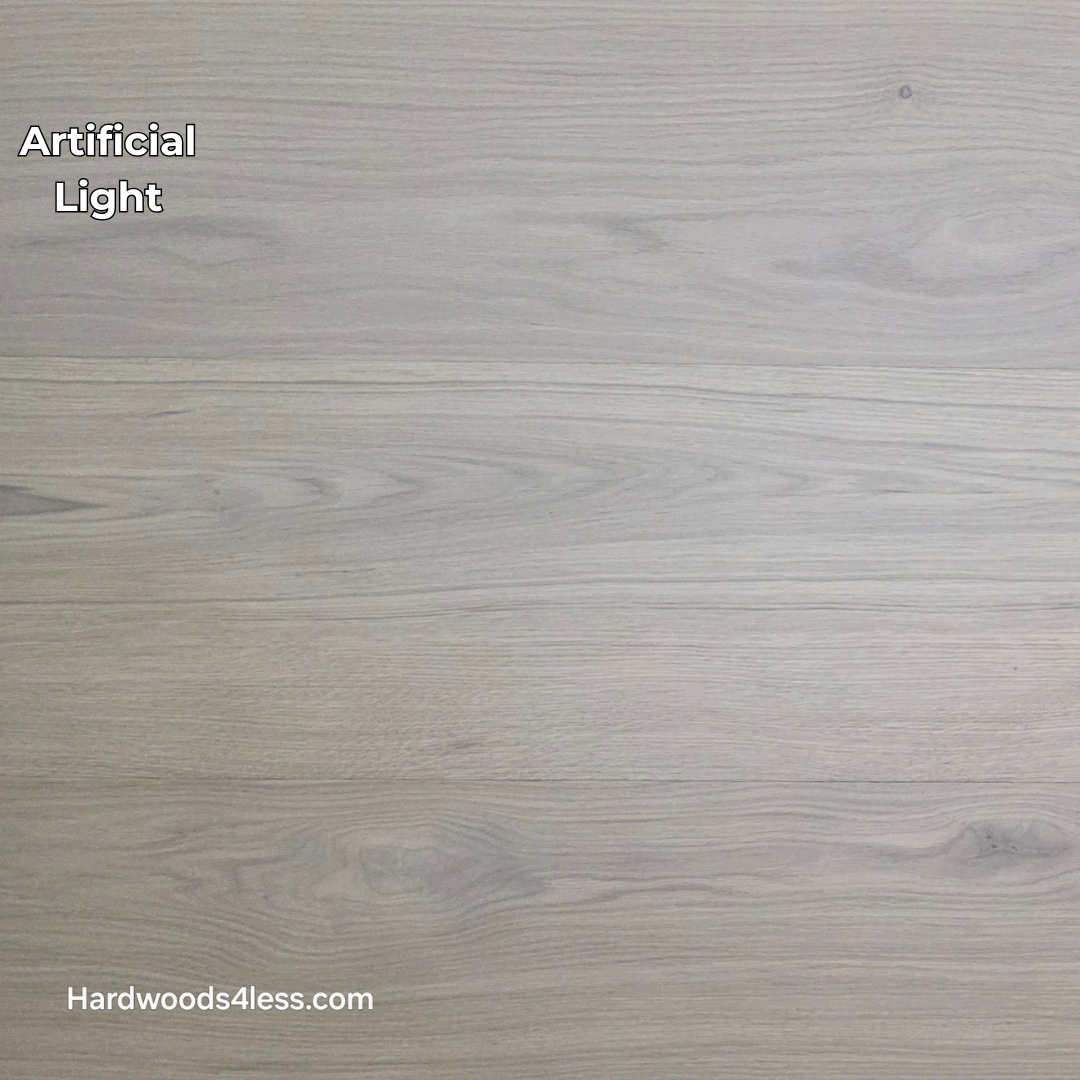10.67" x 7/16" Modernized Engineered European Oak Foster Hardwood Flooring. Shown in artificial lighting. This is a Laminate look alike. 