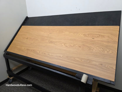 10.67" x 7/16" Modernized Engineered European Oak Hadid Hardened Hardwood Flooring.  Shown on a black shooting table. Shot from wide reight.