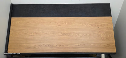 10.67" x 7/16" Modernized Engineered European Oak Hadid Hardened Hardwood Flooring.  Shown on a black shooting table. Shot from center. 