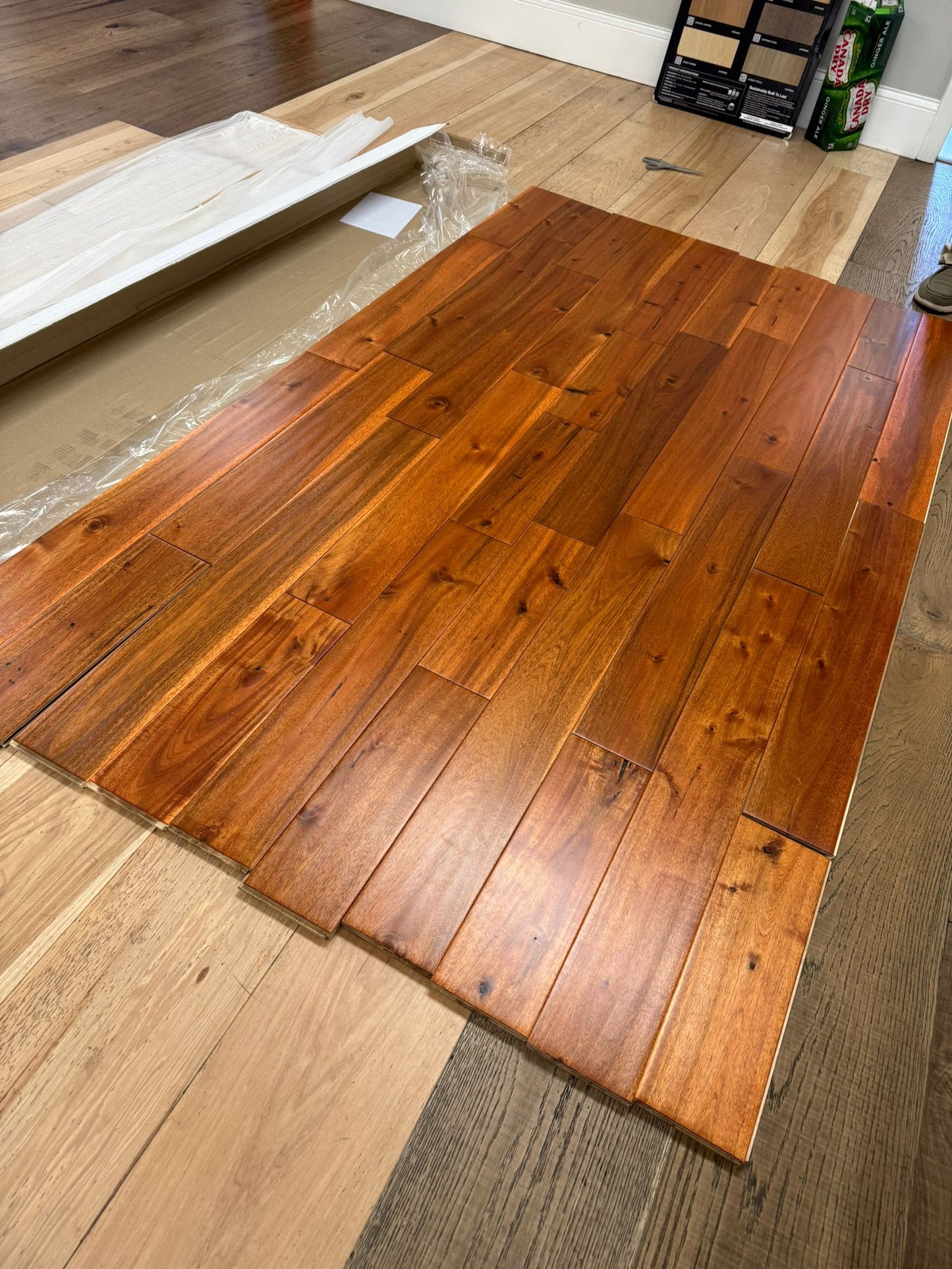5" x 3/4" Solid Acacia Golden Hour Hardwood Flooring. Shown on a floor as a whole box. 