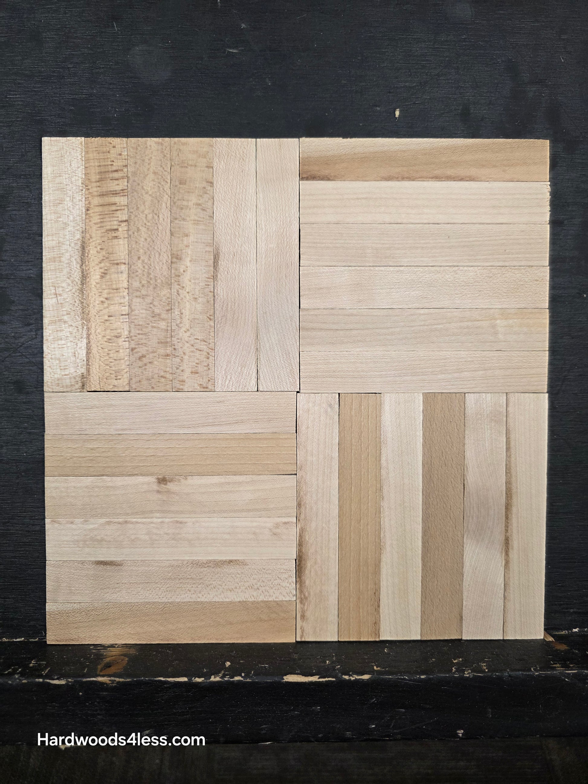 11" x 11" x 5/16" Unfinished Maple 6-slat Parquet Hardwood Flooring. Shown on a black shooting table. 