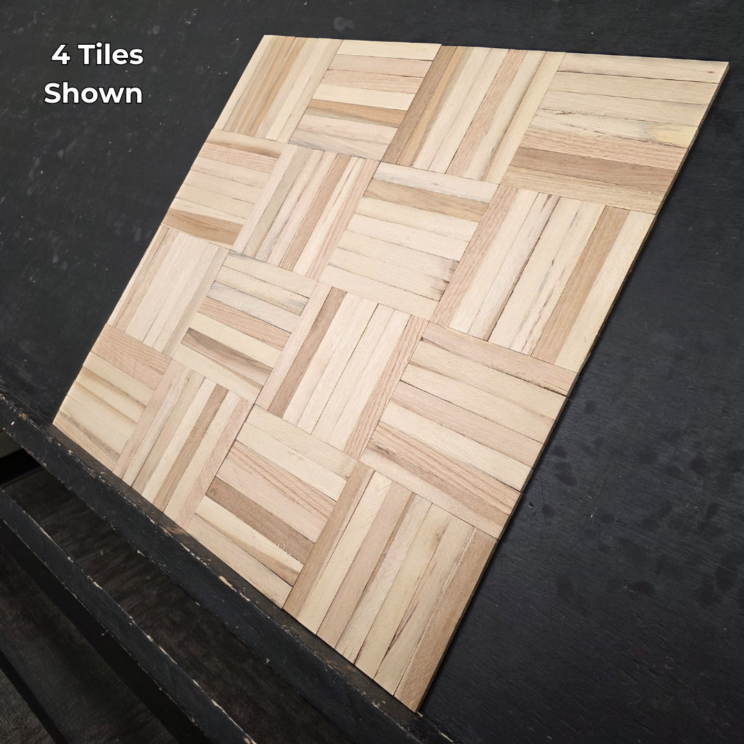 12" x 12" x 5/16" Unfinished Hickory 7-slat Parquet Hardwood Flooring. Shown as 4 tiles on a black shooting table. shot from steep right.