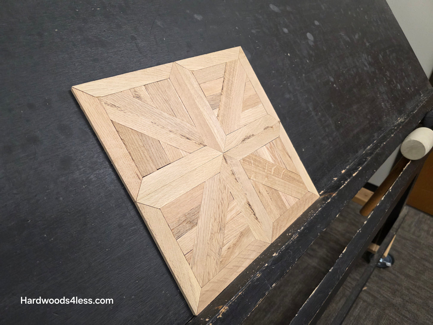13 516 x 13 516 x 516 Unfinished White Oak Canterbury Parquet Flooring. shot from steep left.