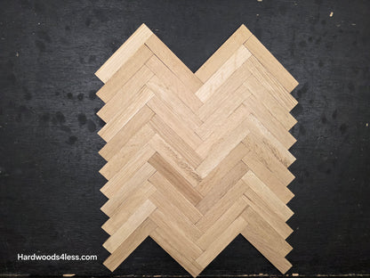14 1/8" x 18 1/8" x 5/16" Unfinished White Oak Herringbone Parquet Flooring. 1 tile close up on a black shooting table.