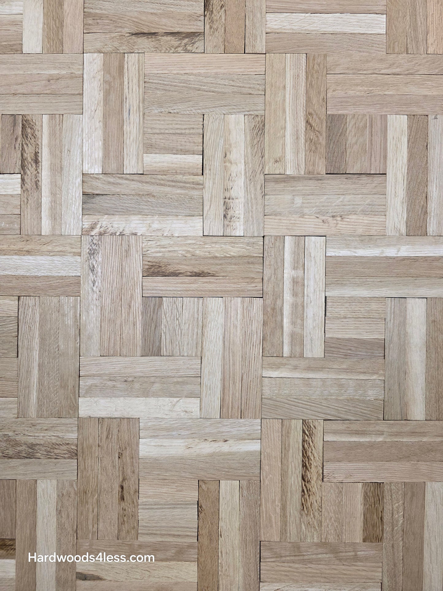 14 ¼ x 14 ¼ x 5/16 Unfinished White Oak Haddon Hall Parquet Flooring. Shown close up. 