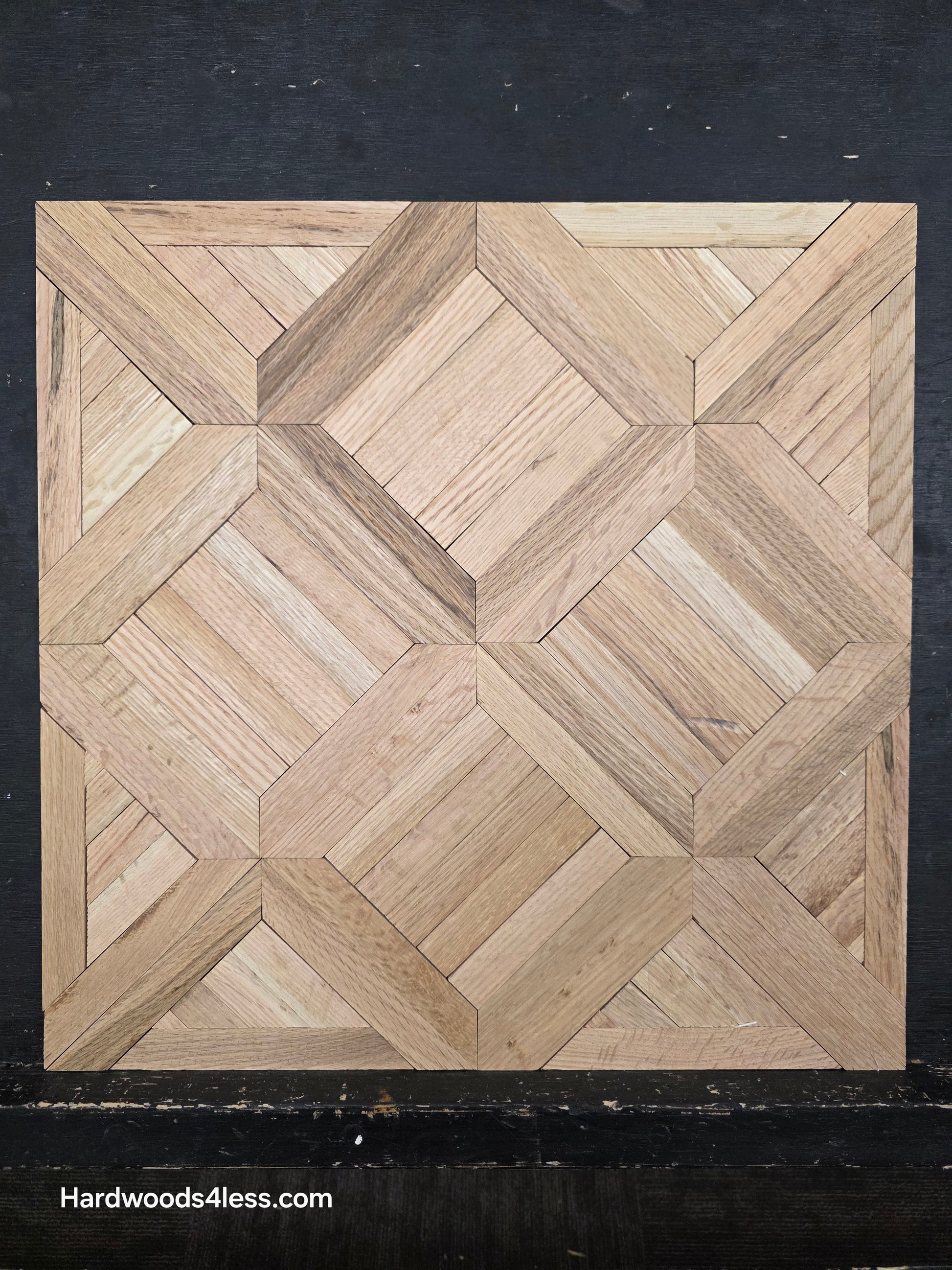 19" x 19" x 5/16" Unfinished White Oak Saxony Parquet Flooring. Shown on a black shooting table. Close up.