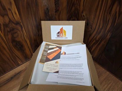 Hardwood Flooring sample box with  brochures on a wooden surface