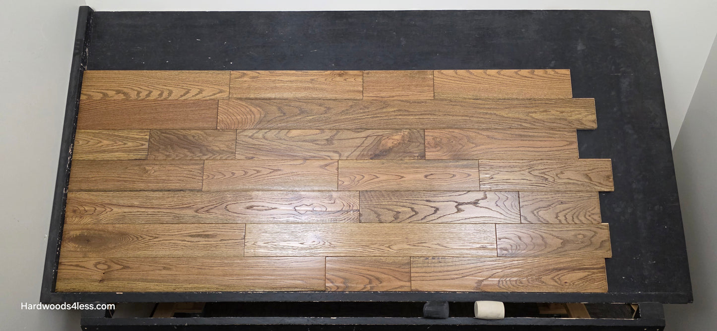 Solid Red Oak Purslane Hardwood Flooring shown on a black shooting rack shot from center