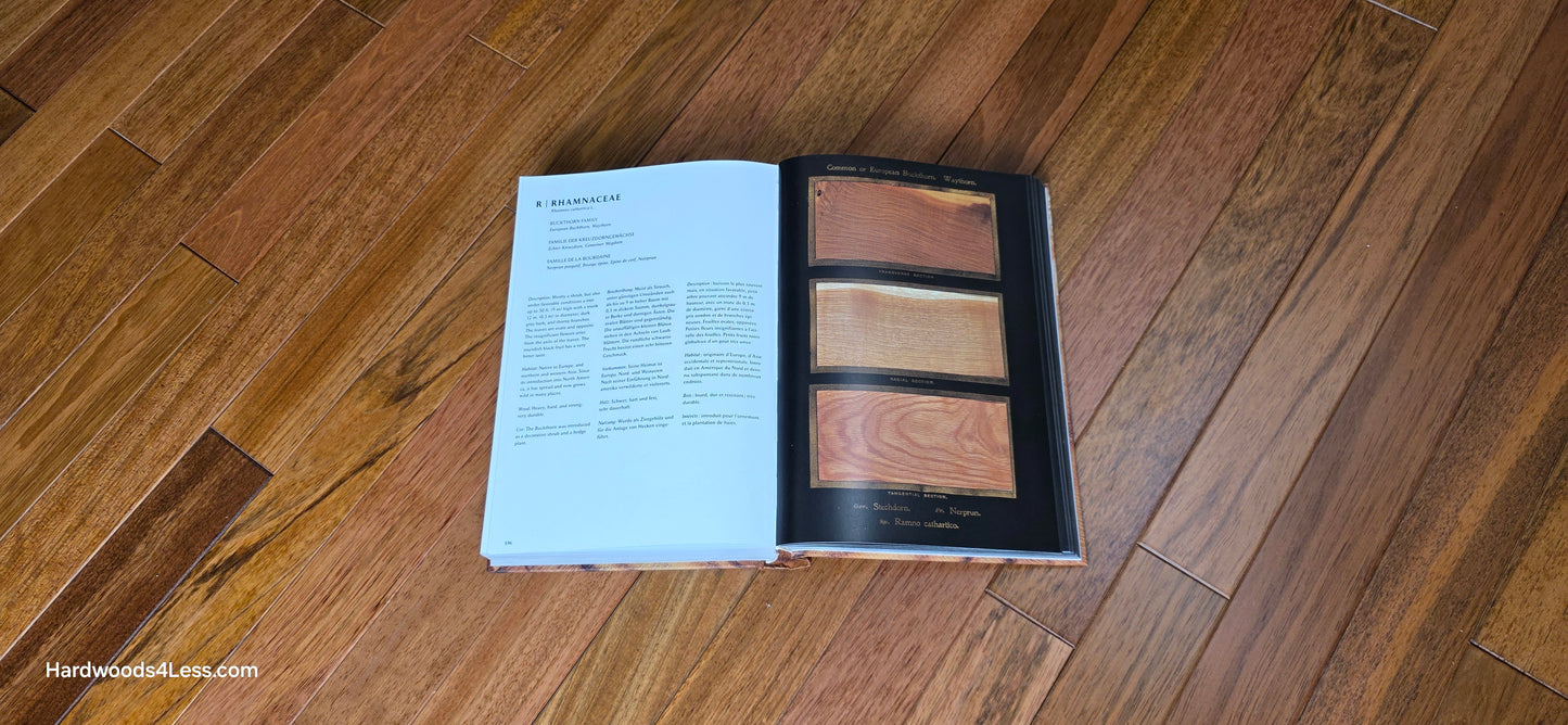 2 1/4" x 3/4" Brazilian Cherry Hardwood Flooring. Shown with a hardwood book open to a random page. The book is center frame on top of the Brazilian Cherry flooring.