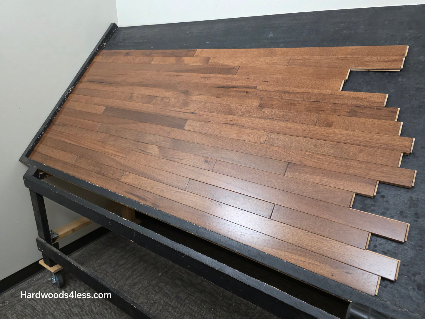 2 1/4" x 3/4" Hickory Nubuck Hardwood Flooring shown on a black shooting table. Shot from the Right hand side. 