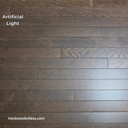 2 1/4" x 3/4" Solid Oak Modica Hardwood Flooring. Shown in artificial lighting. 