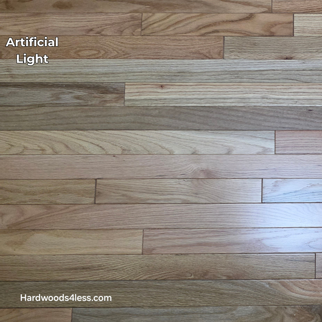 2 1/4" x 3/4" Solid Red Oak Natural Mill Run Hardwood Flooring. Shown in artificial lighting. 