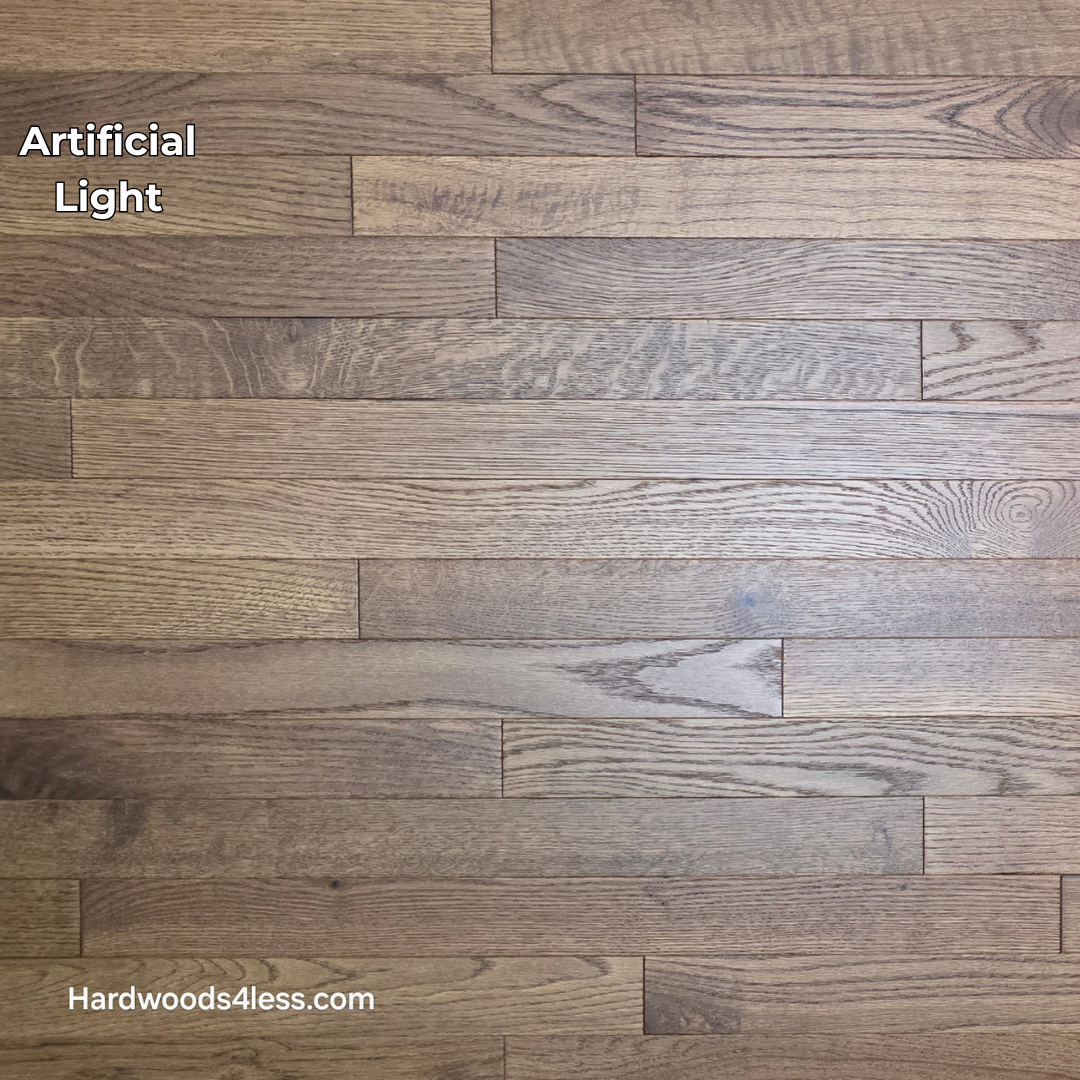 2 1/4" x 3/4" White Oak Gunstock Hardwood Flooring. Shown in artificial lighting.
