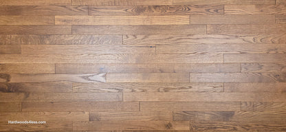 2 1/4" x 3/4" White Oak Gunstock Hardwood Flooring. Shown close up.