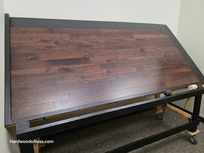 3 1/2" x 3/4" Solid White Oak Ristretto Hardwood Flooring. Shown on a black shooting table. Shot from wide left.