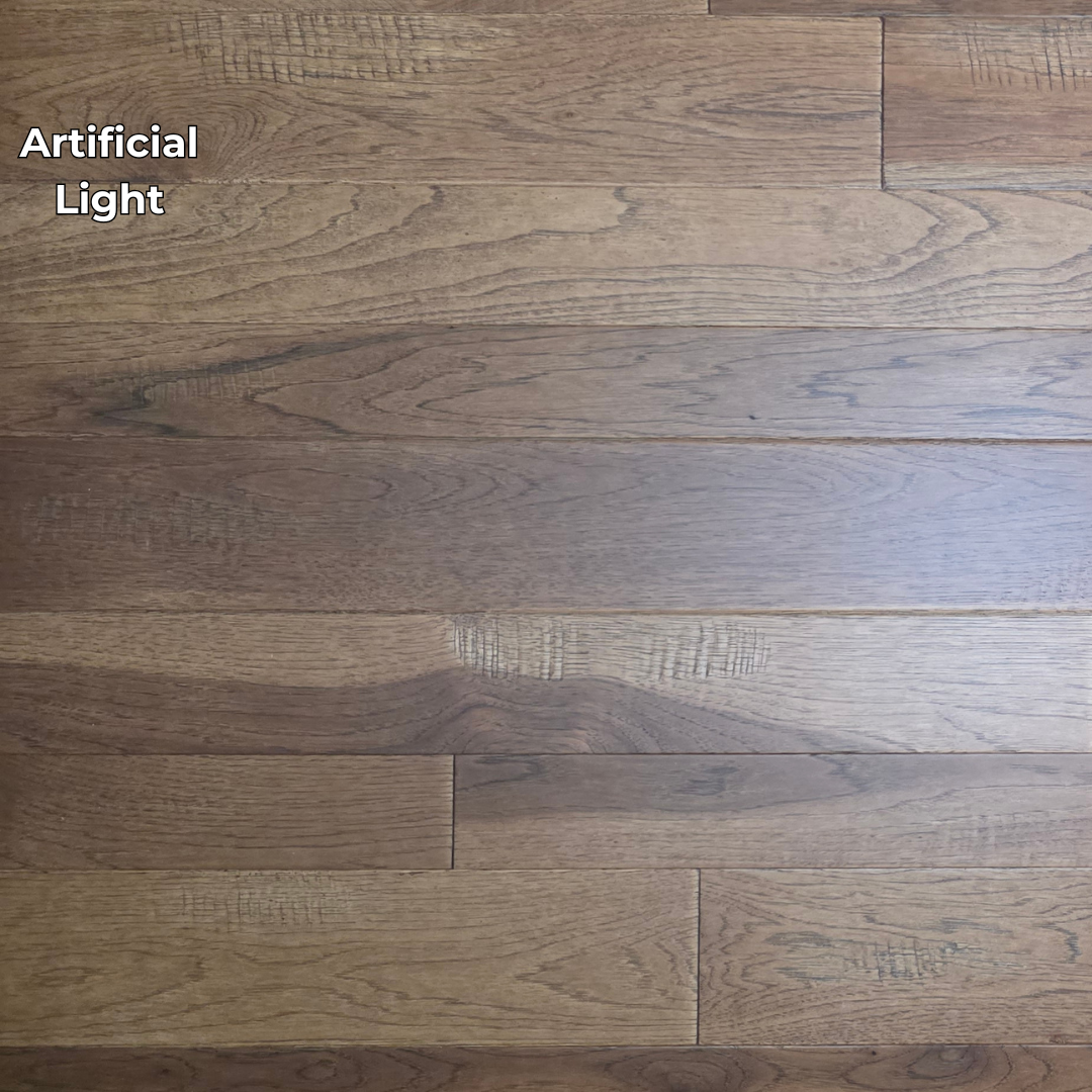3 1/4", 4", 5" Mixed Width Engineered Hickory Regal Helm Hardwood Flooring.  Shown in Artificial lighting.