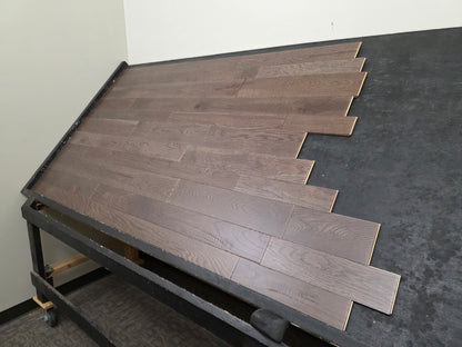 3 1/4", 4", 5" Mixed Width Engineered White Oak Transom Hardwood Flooring. Shown on a black shooting table. Right side shot. 