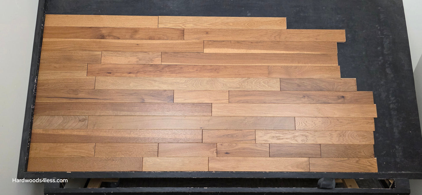 3 1/4" x 3/4" Hickory Molasses Character Grade Hardwood Flooring. Shown on a black shooting table. Center shot.