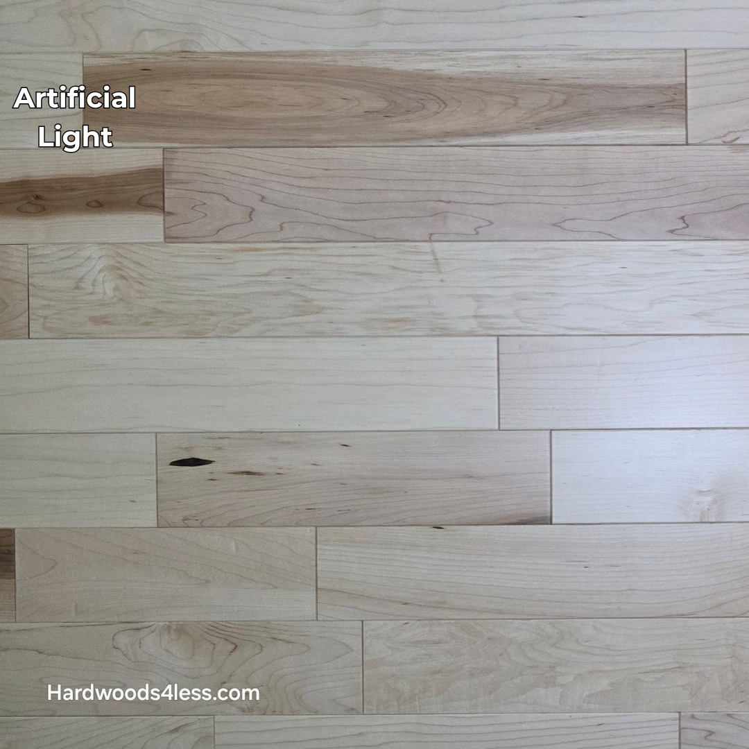 3 1/4" x 3/4" Solid Maple Natural Rustic Shorts Hardwood Flooring. Shown in artificial lighting.