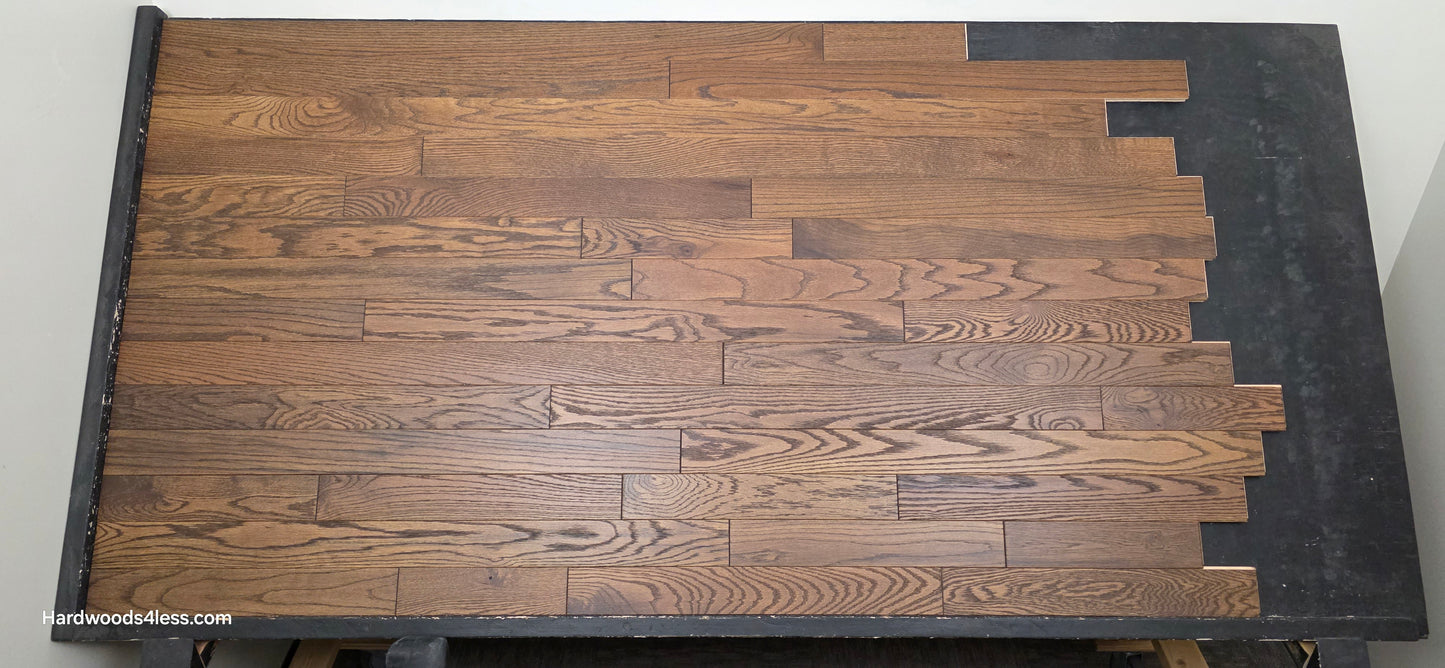 3 1/4" x 3/4" Solid Red Oak Bronze Hardwood Flooring. Shown on a black shooting table. Center shot.