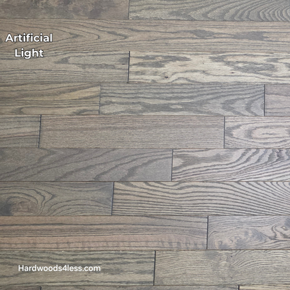 3 1/4" x 3/4" Solid Red Oak Coal Hardwood Flooring. Shown in artificial lighting.